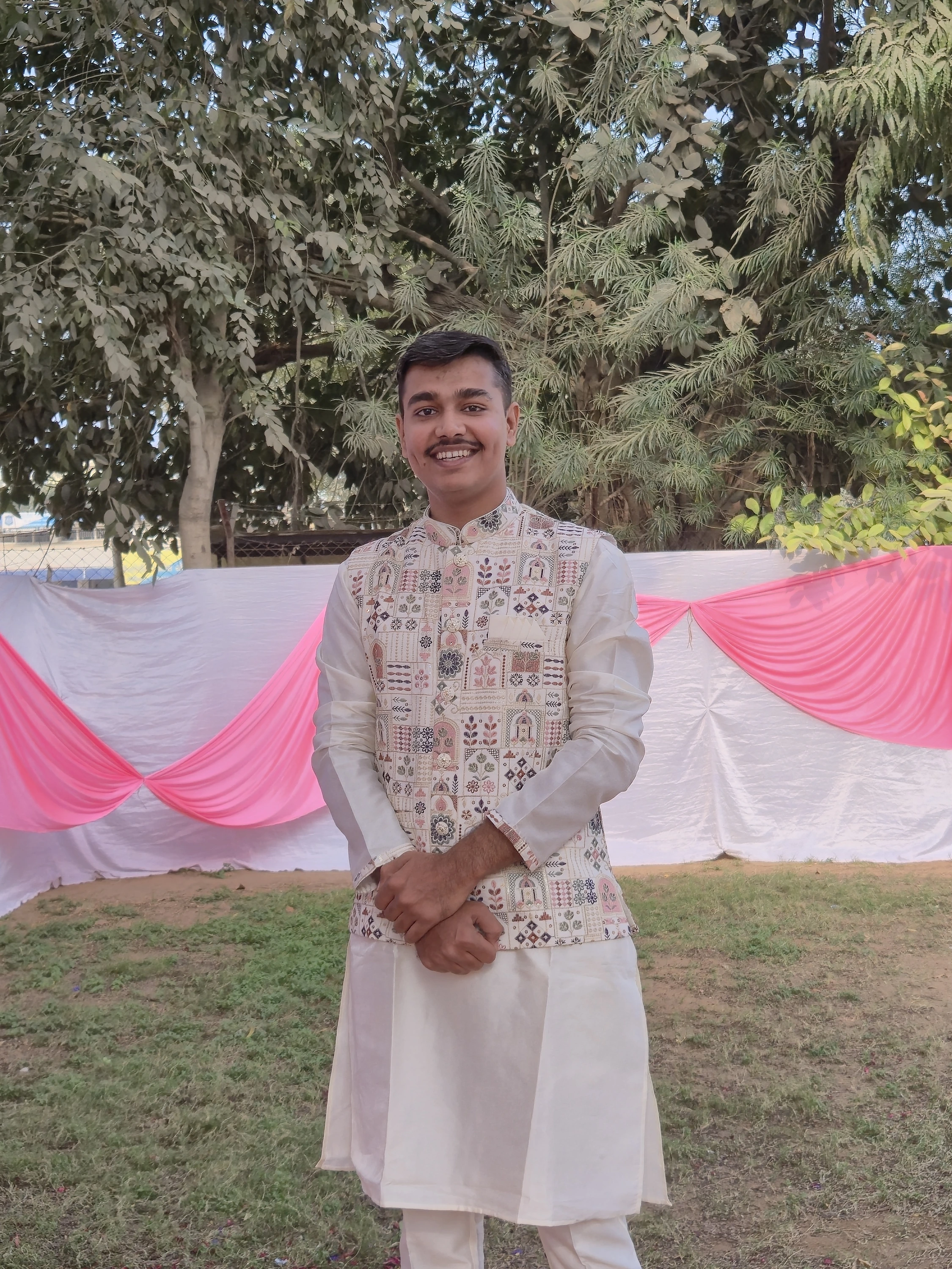 Amit at home in traditional clothing