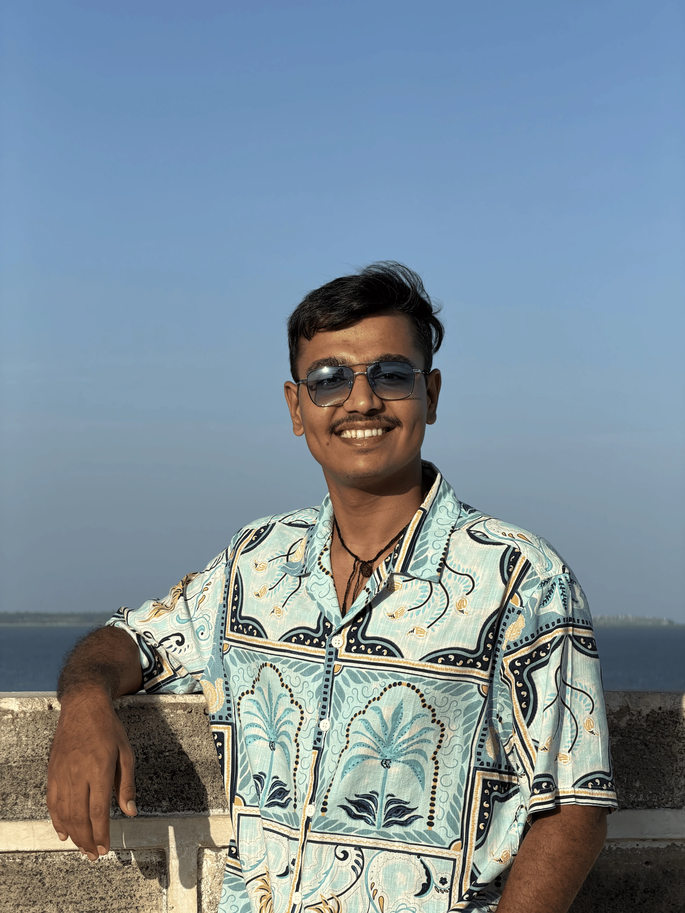 Amit with friends, present day