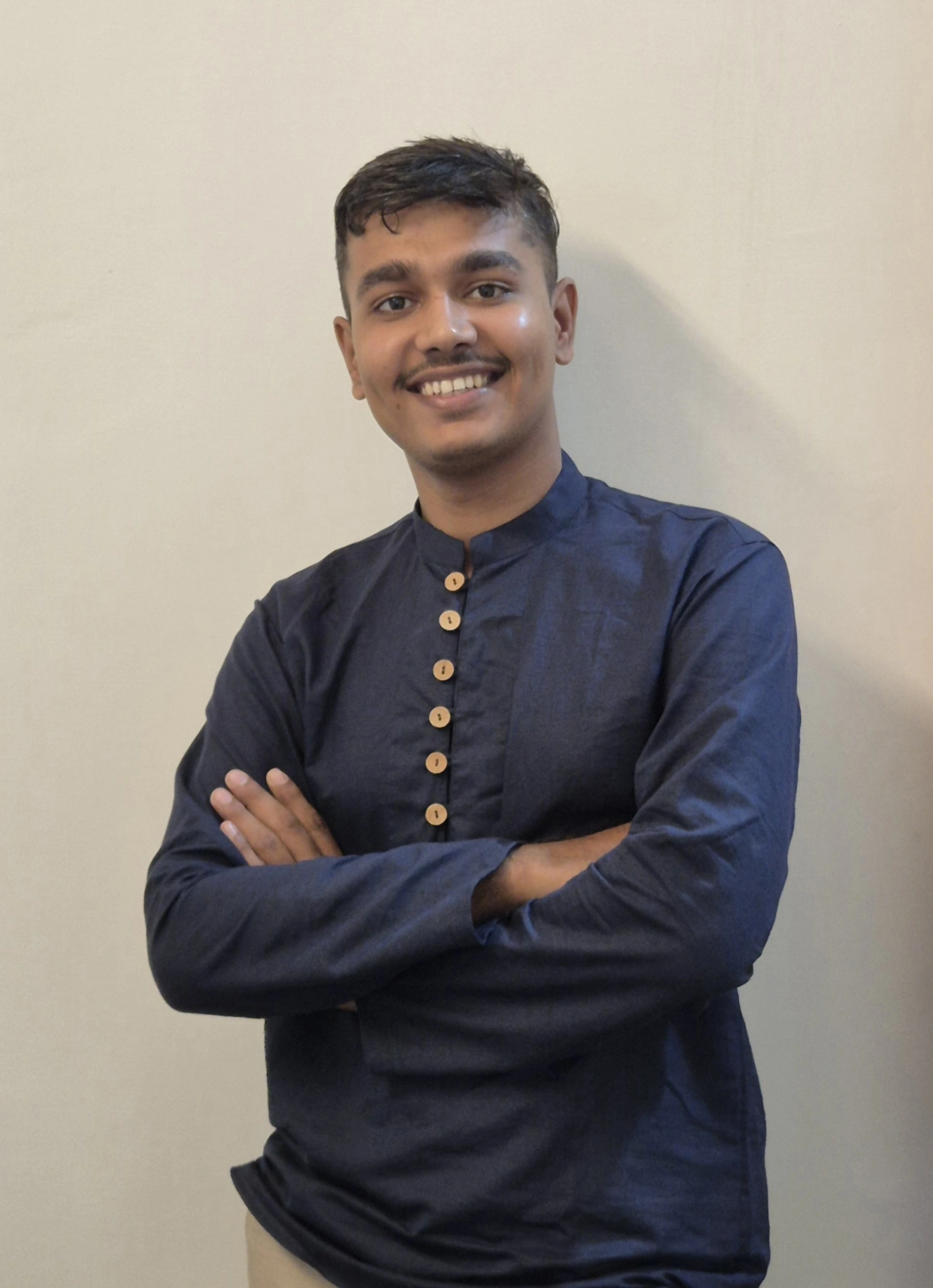 Portrait of Amit Gohel in a navy kurta